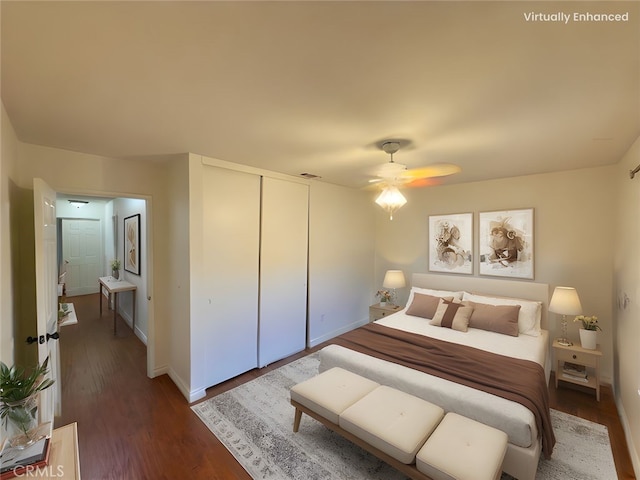 25488 Orange Crest Way, Loma Linda, CA 92354 - bedroom featuring dark wood-type flooring, a closet, and a ceiling fan