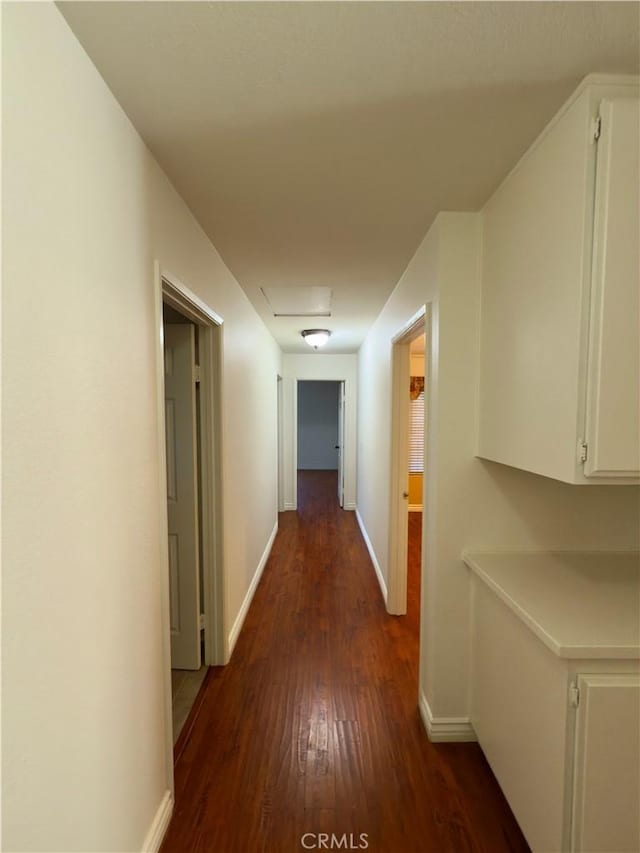 25488 Orange Crest Way, Loma Linda, CA 92354 - hallway with dark wood-type flooring and baseboards