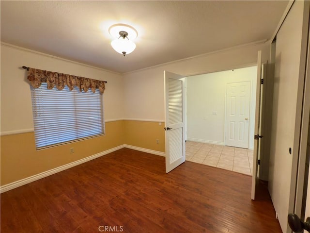 25488 Orange Crest Way, Loma Linda, CA 92354 - empty room with wood finished floors and ornamental molding