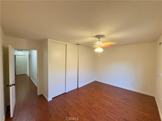 25488 Orange Crest Way, Loma Linda, CA 92354 - unfurnished bedroom featuring dark wood-style floors, a closet, and ceiling fan