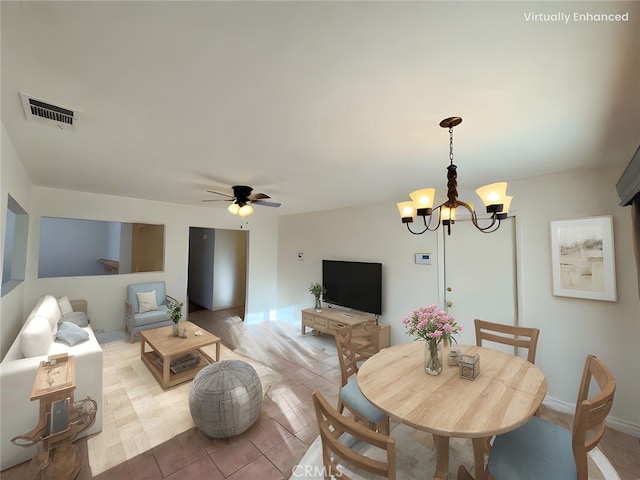 25488 Orange Crest Way, Loma Linda, CA 92354 - dining area with a chandelier and ceiling fan