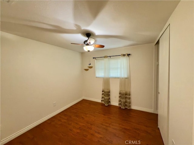 25488 Orange Crest Way, Loma Linda, CA 92354 - empty room with a ceiling fan and dark wood-style flooring