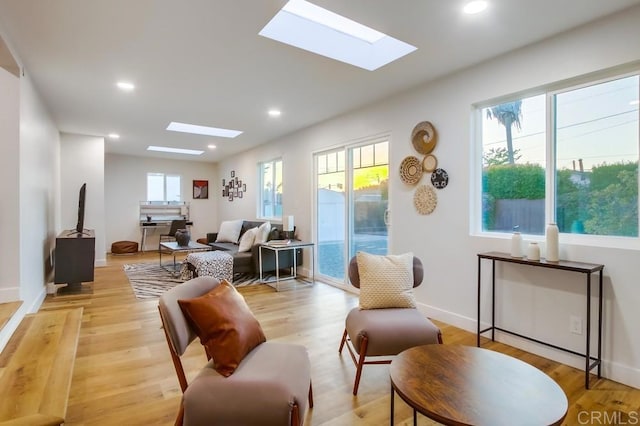 482 Wykes St, Chula Vista, CA 91911 - living room featuring a skylight, light wood-style flooring, and recessed lighting