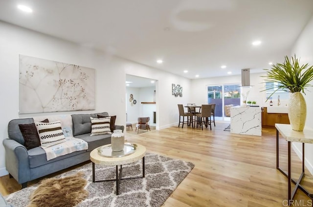 482 Wykes St, Chula Vista, CA 91911 - living area with light wood-style floors and recessed lighting