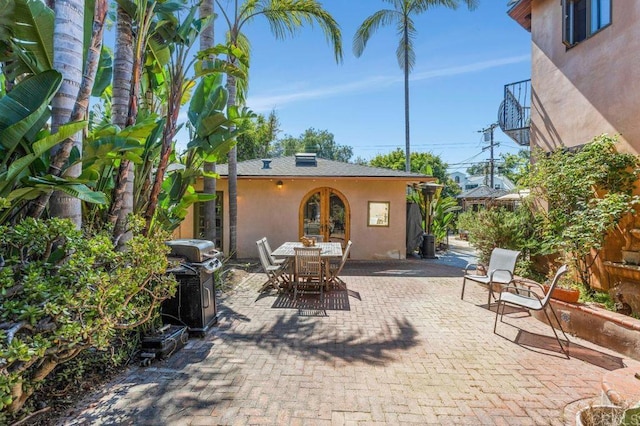 934 Arden Dr, Encinitas, CA 92024 - view of patio featuring outdoor dining area, french doors, and grilling area