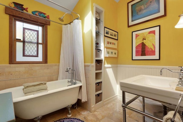 934 Arden Dr, Encinitas, CA 92024 - full bath featuring wainscoting, a freestanding bath, a shower with shower curtain, and tile patterned flooring