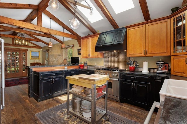 934 Arden Dr, Encinitas, CA 92024 - kitchen with high end range, custom exhaust hood, a peninsula, glass insert cabinets, and dark wood-type flooring