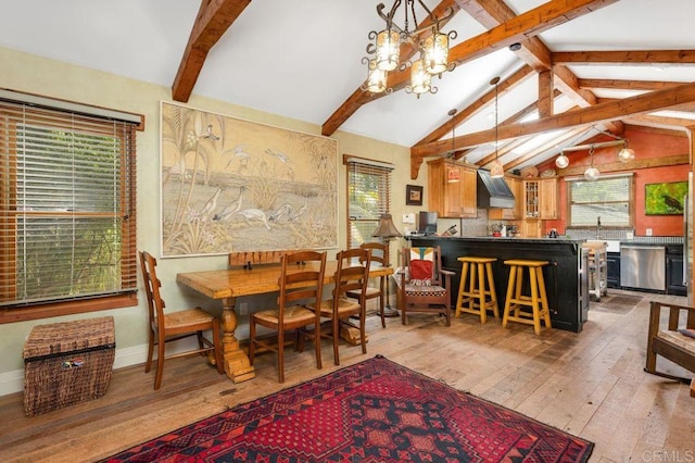934 Arden Dr, Encinitas, CA 92024 - dining space with wood-type flooring and a chandelier