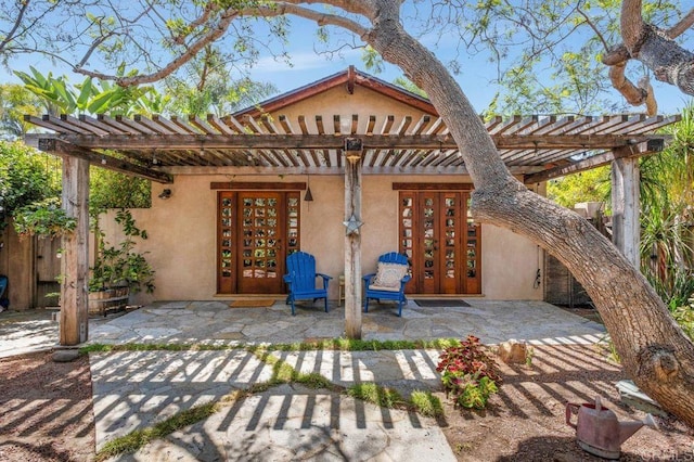 934 Arden Dr, Encinitas, CA 92024 - view of patio featuring french doors and a pergola
