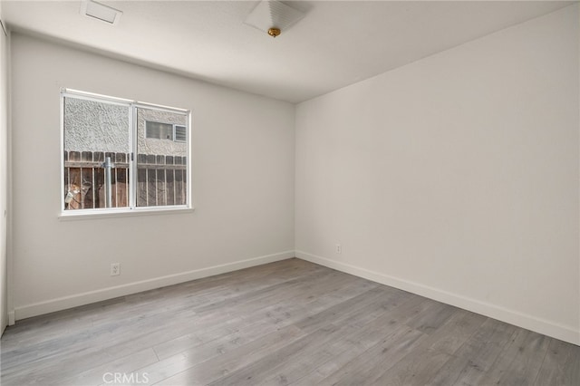 7353 Cascade Ct, Rancho Cucamonga, CA 91730 - empty room featuring wood finished floors and baseboards
