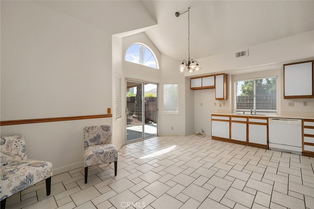 7353 Cascade Ct, Rancho Cucamonga, CA 91730 - kitchen featuring white dishwasher, a chandelier, light countertops, decorative light fixtures, and white cabinetry