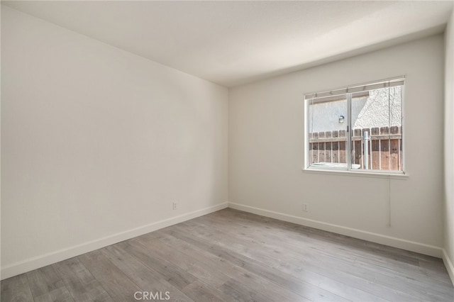 7353 Cascade Ct, Rancho Cucamonga, CA 91730 - spare room featuring baseboards and wood finished floors