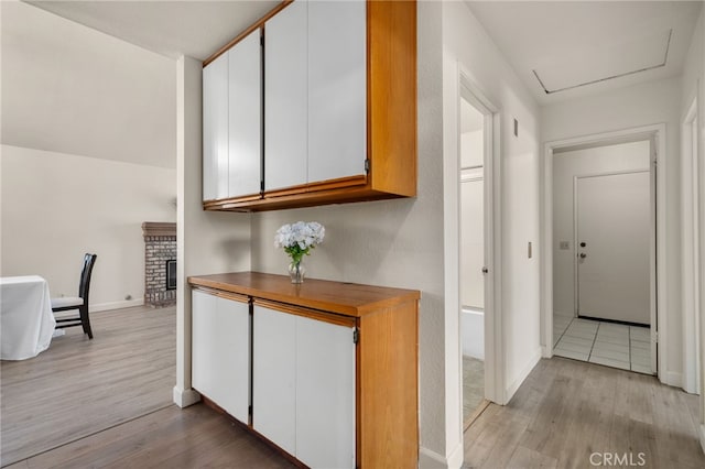 7353 Cascade Ct, Rancho Cucamonga, CA 91730 - corridor featuring light wood-style floors and baseboards