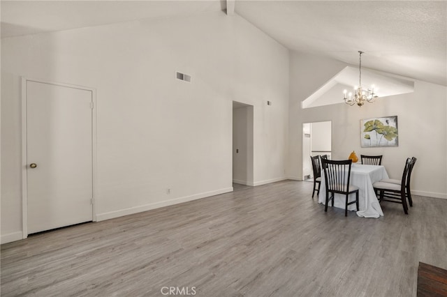 7353 Cascade Ct, Rancho Cucamonga, CA 91730 - dining area featuring high vaulted ceiling, a chandelier, wood finished floors, and beamed ceiling