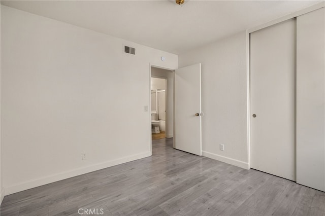 7353 Cascade Ct, Rancho Cucamonga, CA 91730 - unfurnished bedroom featuring a closet and light wood-style flooring