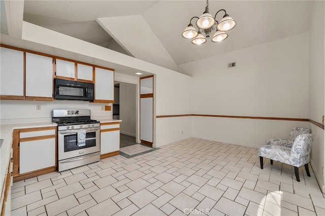 7353 Cascade Ct, Rancho Cucamonga, CA 91730 - kitchen featuring black microwave, stainless steel range with gas stovetop, light countertops, a chandelier, and white cabinetry