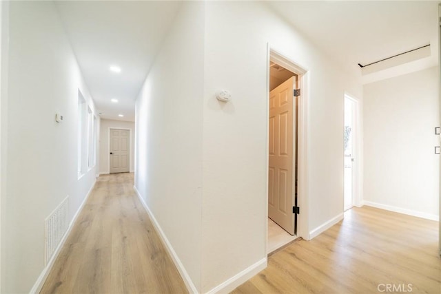 5955 Scheelite St, Jurupa Valley, CA 92509 - hall featuring light wood-style floors and recessed lighting