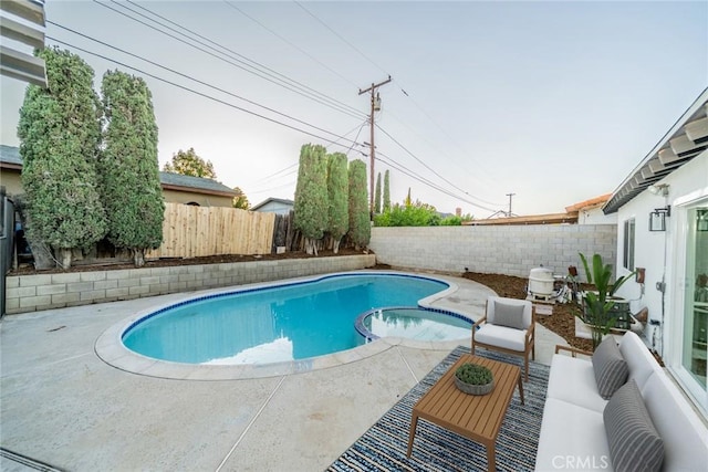 5955 Scheelite St, Jurupa Valley, CA 92509 - view of swimming pool with a pool with connected hot tub, a fenced backyard, and a patio area