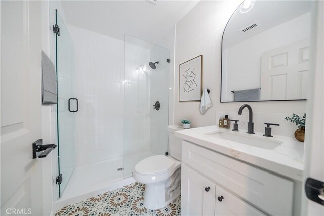 5955 Scheelite St, Jurupa Valley, CA 92509 - bathroom featuring vanity, a stall shower, and tile patterned floors