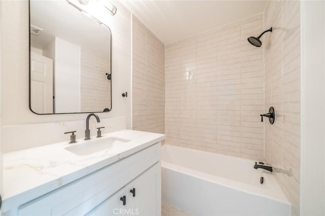 5955 Scheelite St, Jurupa Valley, CA 92509 - bathroom featuring vanity and shower / tub combination