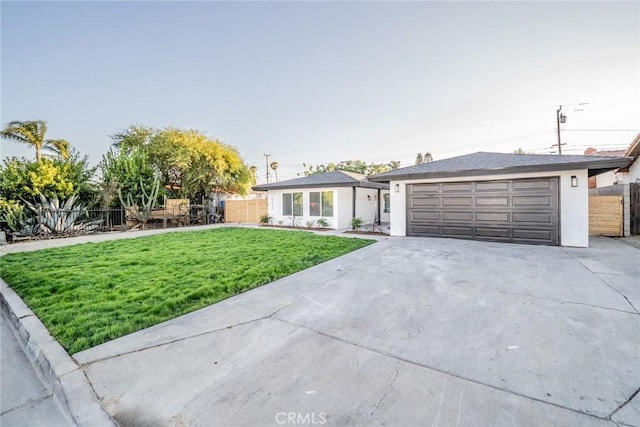 5955 Scheelite St, Jurupa Valley, CA 92509 - ranch-style house featuring driveway and stucco siding