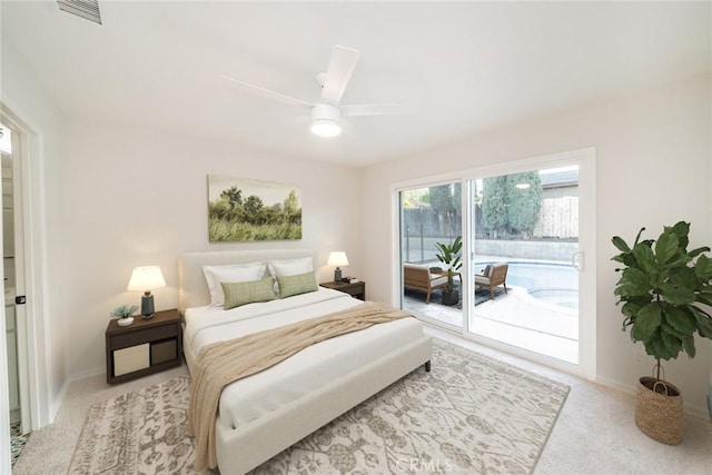 5955 Scheelite St, Jurupa Valley, CA 92509 - carpeted bedroom featuring access to outside and ceiling fan