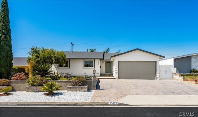 15027 Barnwall St, La Mirada, CA 90638 - ranch-style house with an attached garage and driveway
