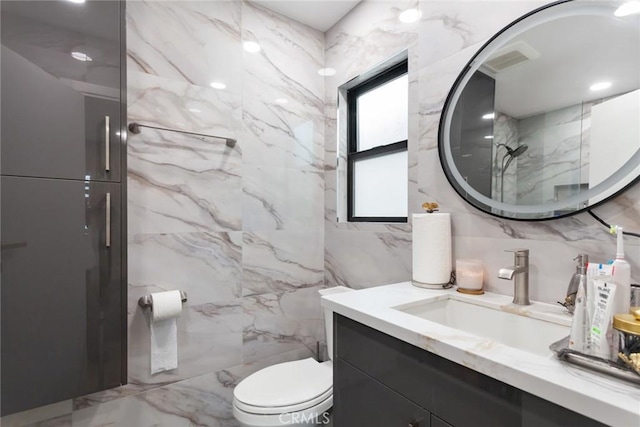 10535 Reseda Blvd, Porter Ranch, CA 91326 - bathroom featuring tile walls, vanity, and a marble finish shower