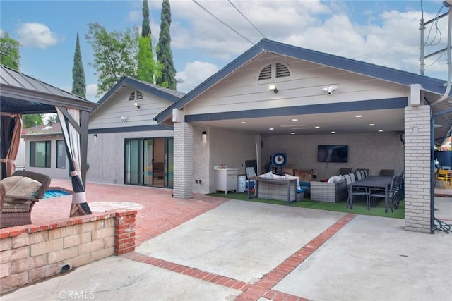 10535 Reseda Blvd, Porter Ranch, CA 91326 - back of house with a gazebo, outdoor lounge area, and a patio