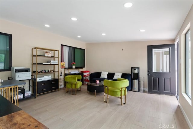 10535 Reseda Blvd, Porter Ranch, CA 91326 - living room featuring light wood-style floors and recessed lighting