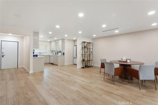 10535 Reseda Blvd, Porter Ranch, CA 91326 - dining area with light wood-style flooring and recessed lighting
