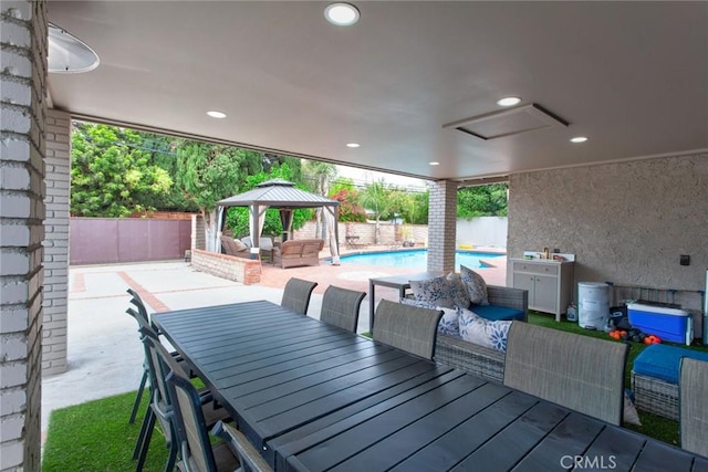 10535 Reseda Blvd, Porter Ranch, CA 91326 - fenced backyard with an outdoor hangout area, a gazebo, a patio area, and outdoor dining space
