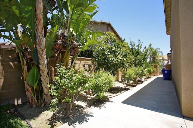 5621 Avocet Dr, Jurupa Valley, CA 91752 - view of property exterior featuring a fenced backyard, stucco siding, and a patio