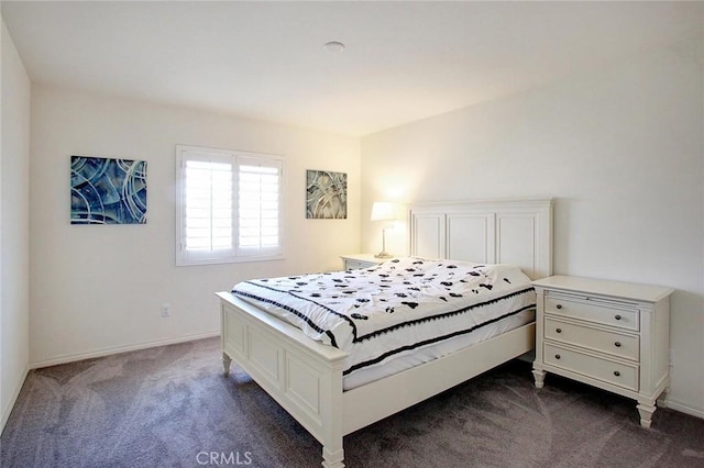 5621 Avocet Dr, Jurupa Valley, CA 91752 - bedroom featuring dark carpet and baseboards
