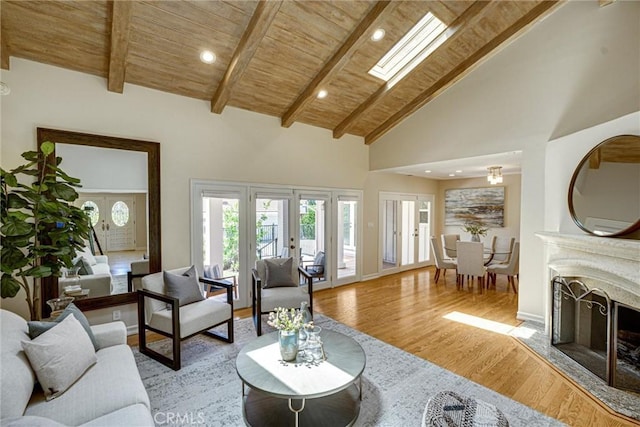 4843 Texhoma Ave, Encino, CA 91316 - living room with a wooden ceiling with exposed beams, wood finished floors, high vaulted ceiling, recessed lighting, and french doors