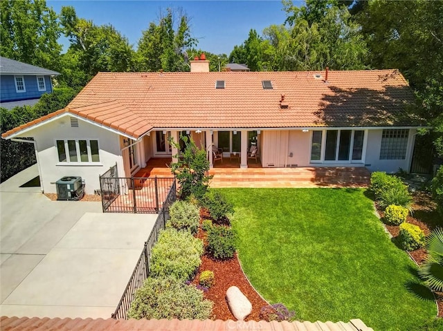 4843 Texhoma Ave, Encino, CA 91316 - view of front of property featuring a chimney, a front yard, a tile roof, and stucco siding