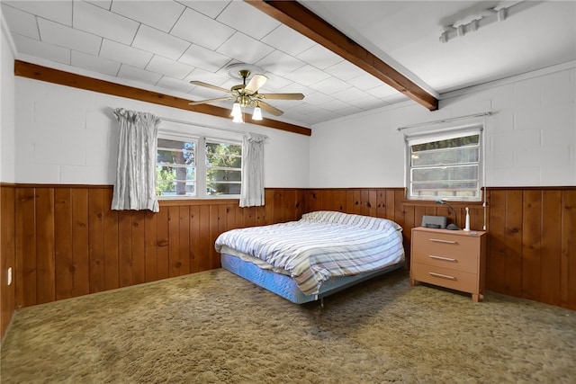 824 De La Fuente St, Monterey Park, CA 91754 - bedroom with a wainscoted wall, wood walls, beamed ceiling, and a ceiling fan