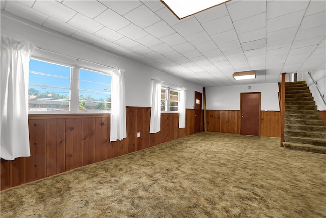 824 De La Fuente St, Monterey Park, CA 91754 - empty room with wooden walls, a wainscoted wall, carpet, and stairs