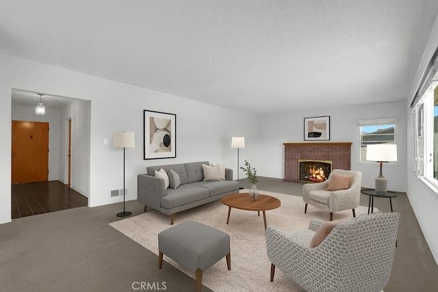 824 De La Fuente St, Monterey Park, CA 91754 - carpeted living area with a brick fireplace and a textured ceiling