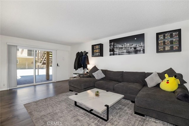 10757 Hortense St Unit 102, North Hollywood, CA 91602 - living area with wood finished floors and a textured ceiling
