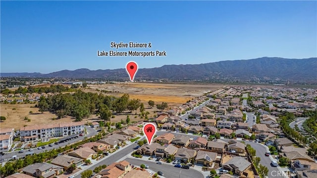 29183 Jacaranda, Lake Elsinore, CA 92530 - aerial view of property and surrounding area with mountains and nearby suburban area