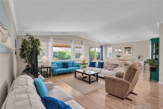 29183 Jacaranda, Lake Elsinore, CA 92530 - living room with vaulted ceiling, light wood-style flooring, a chandelier, and ornamental molding