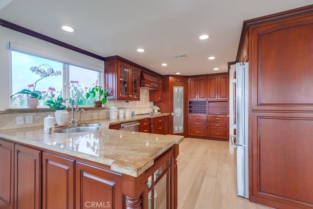 1906 S Patton Ave, San Pedro, CA 90732 - kitchen featuring a peninsula, light stone counters, glass insert cabinets, recessed lighting, and stainless steel appliances