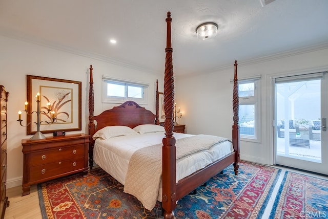 1906 S Patton Ave, San Pedro, CA 90732 - bedroom featuring ornamental molding, access to exterior, multiple windows, and wood finished floors