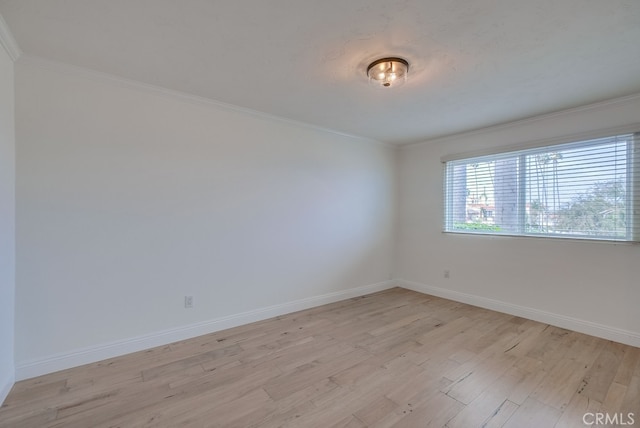 1906 S Patton Ave, San Pedro, CA 90732 - unfurnished room with light wood-style flooring and crown molding