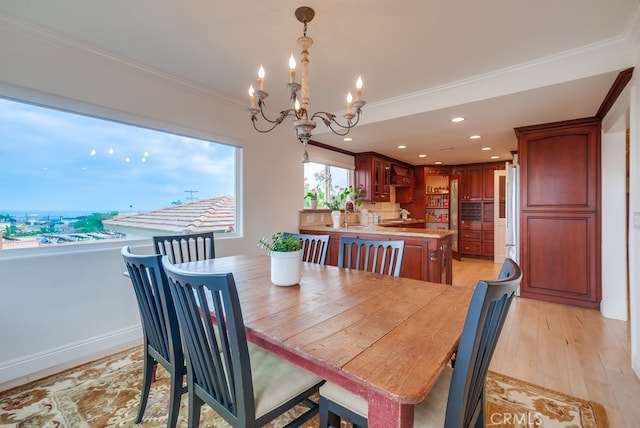 1906 S Patton Ave, San Pedro, CA 90732 - dining space featuring a chandelier, crown molding, light wood-style flooring, and recessed lighting