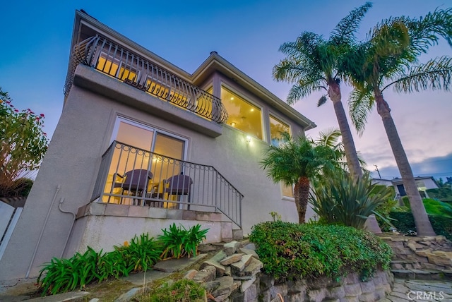 1906 S Patton Ave, San Pedro, CA 90732 - back of house at dusk with a balcony and stucco siding