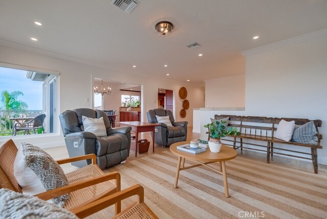 1906 S Patton Ave, San Pedro, CA 90732 - living area featuring ornamental molding, recessed lighting, and a chandelier