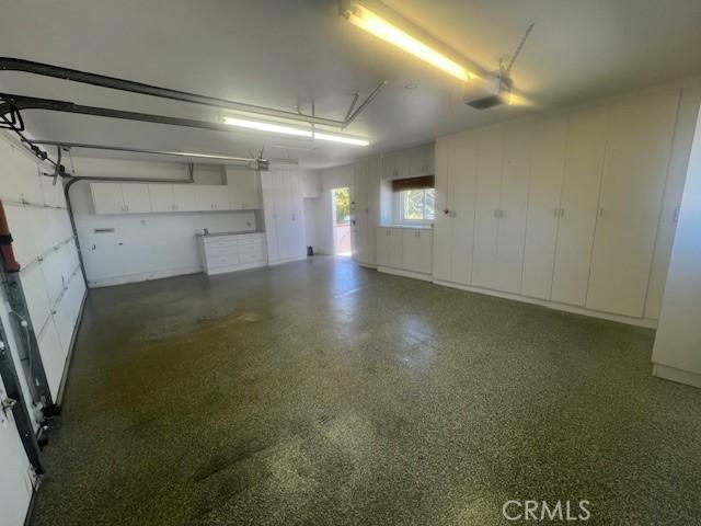 1906 S Patton Ave, San Pedro, CA 90732 - garage featuring a garage door opener