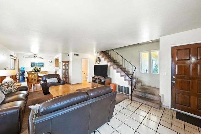 250 65th St, San Diego, CA 92114 - living room featuring stairs, ceiling fan, and light tile patterned floors